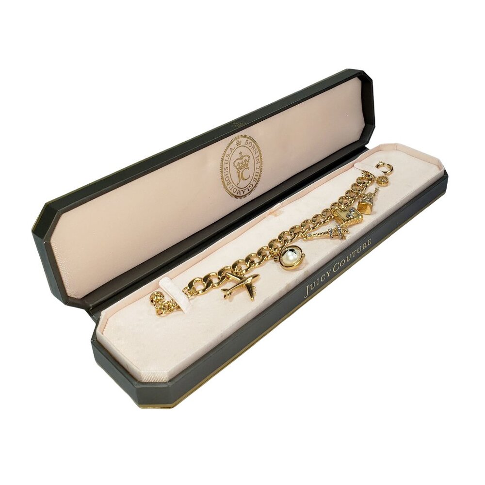 Juicy Couture Travel Icons Charm Bracelet, great vintage style in original box